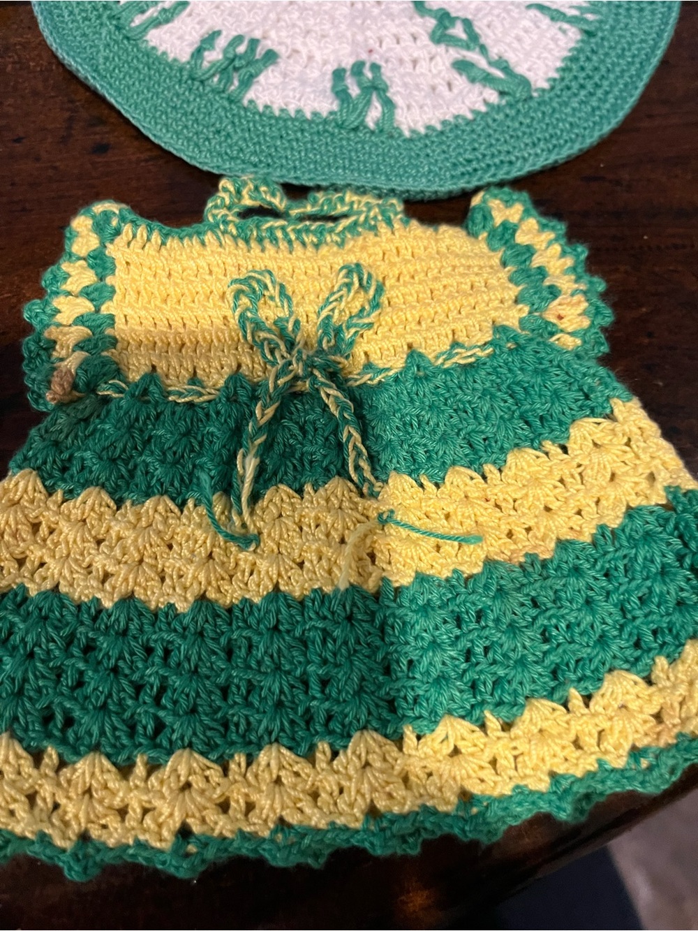 Handmade Green and Yellow Crochet Kitchen Dress Pot Holder and a clock crocheted